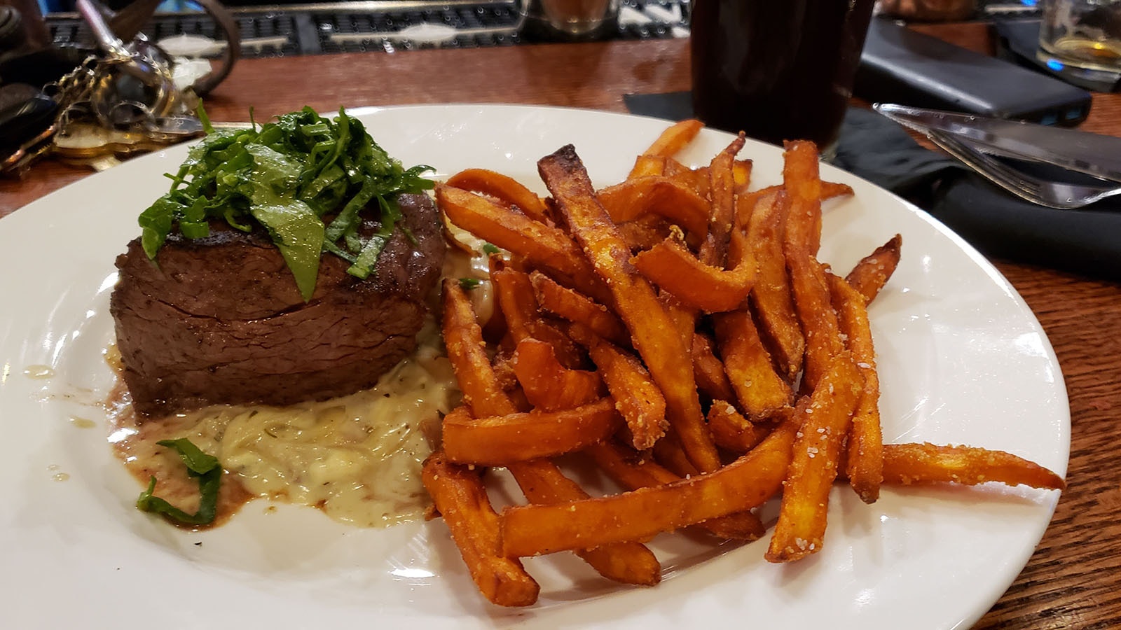 A tender tenderloin paired with sweet potato fries
