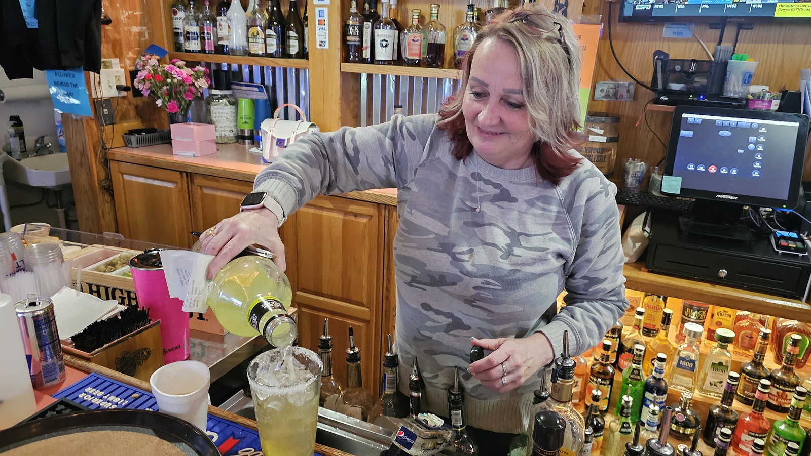 Co-owner Stacey Quick pours a margarita at Frosty's in Casper.