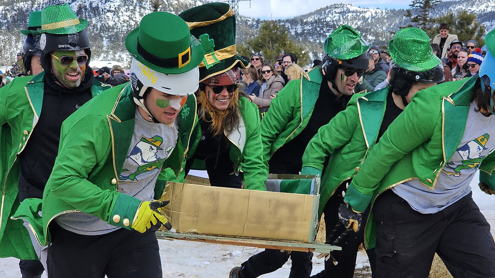 Just look at the intensity on their faces as this team races to the finish line. Even if they're having fun, they're still taking their coffin races pretty seriously.