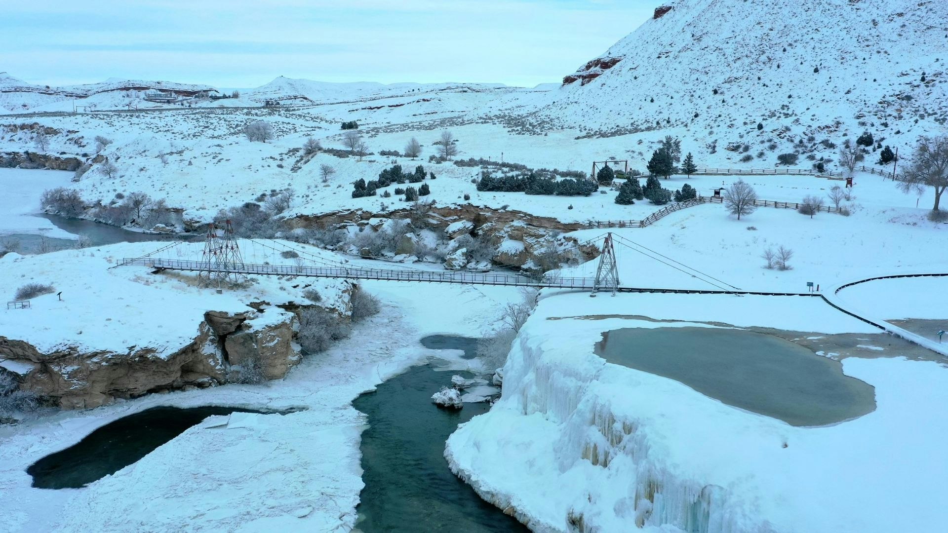 Frozen River Under Thermopolis Swinging Bridge 12 27 22