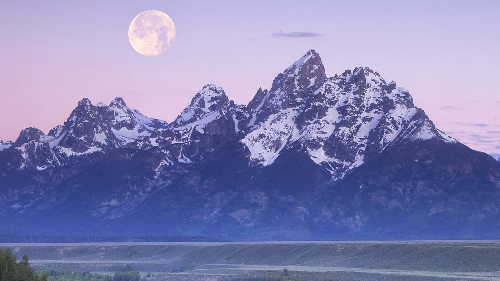 A full moon over the Tetons in Wyoming.