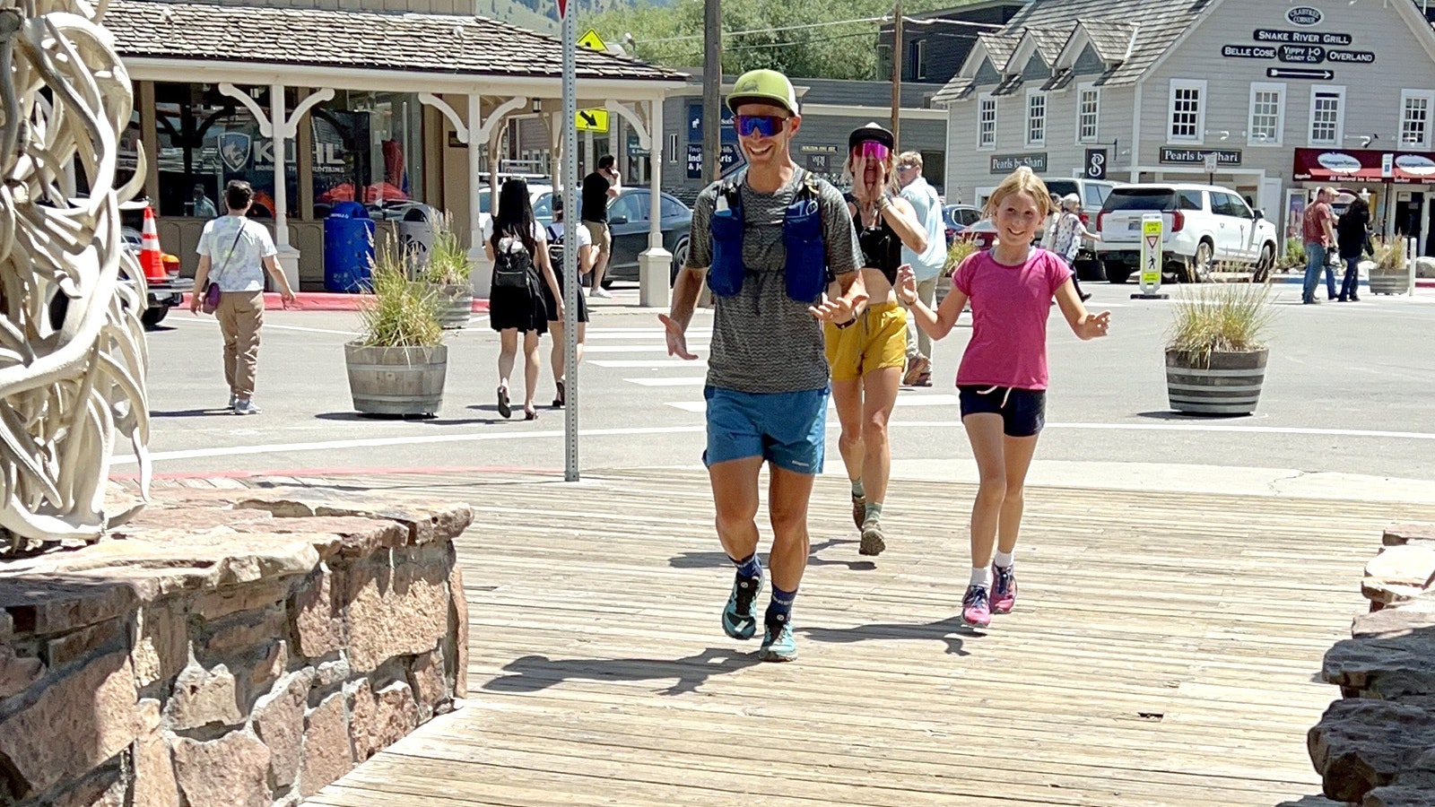 Gabe Joyes of Lander sports a huge smile as he hits Jackson Town Square at the completion of a 180-mile trail run that started in Lander.