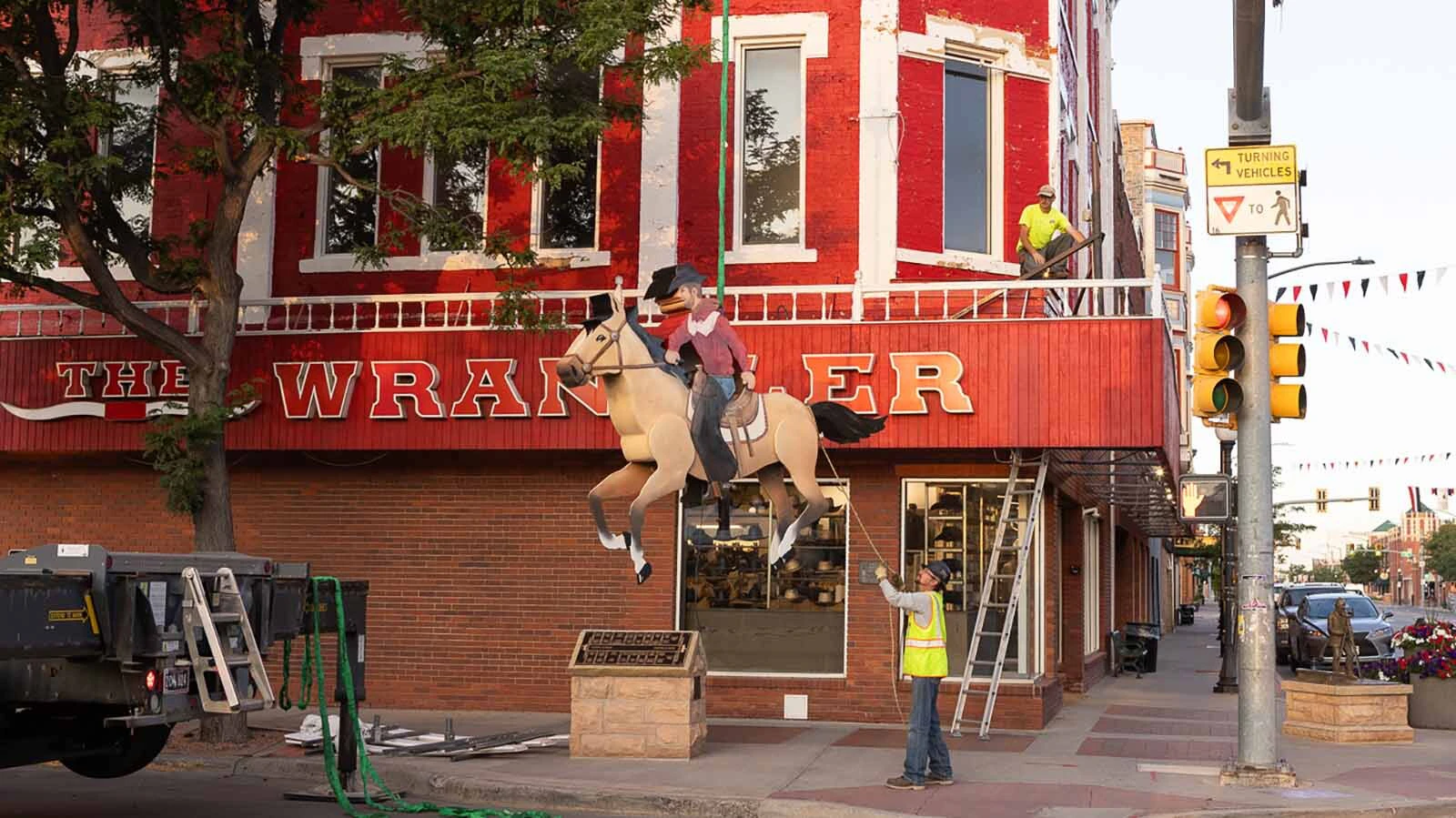 A repaired and refurbished Galloping Horse was put back into place about the entrance to The Wrangler in downtown Cheyenne on Thursday, July 16, 2026.