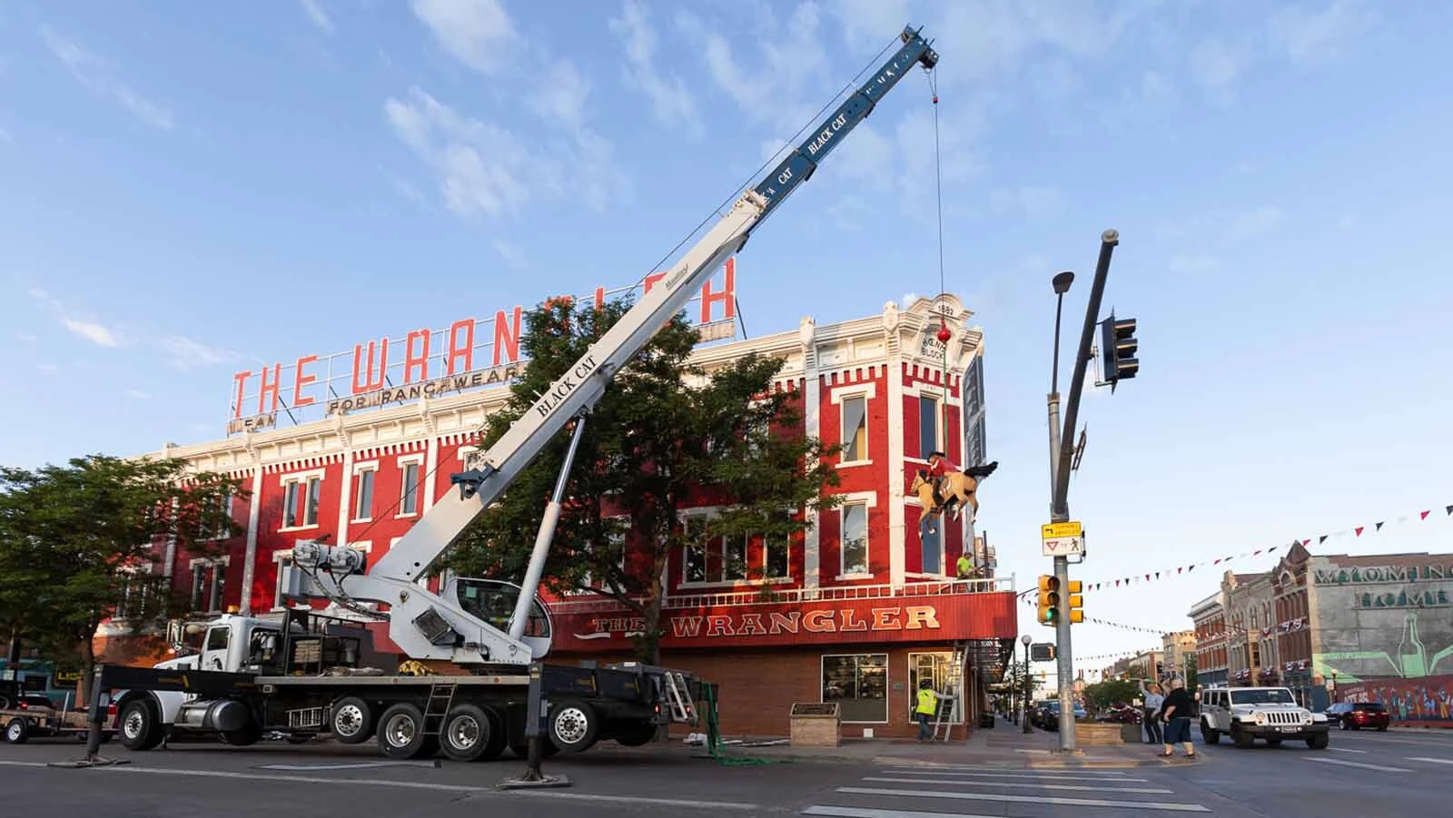 A repaired and refurbished Galloping Horse was put back into place about the entrance to The Wrangler in downtown Cheyenne on Thursday, July 16, 2026.