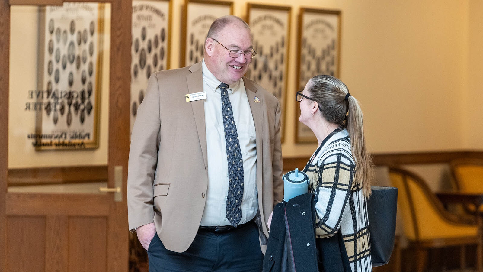 As 41 states open their doors to NIL deals for high school athletes, Wyoming lawmakers backed by a well-known football family are moving to bolt theirs shut. But money is already available for teen sports stars — right next door in Colorado. Above, Gary Crum, R-Laramie, was a football star at Rawlins High School and the University of Wyoming. He says NIL deals don't belong in high school sports.