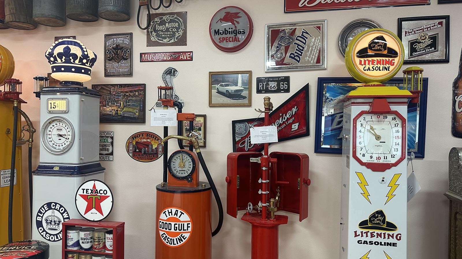 The man cave of Randy Nissen is covered with replica signs to compliment his restored gas pumps.