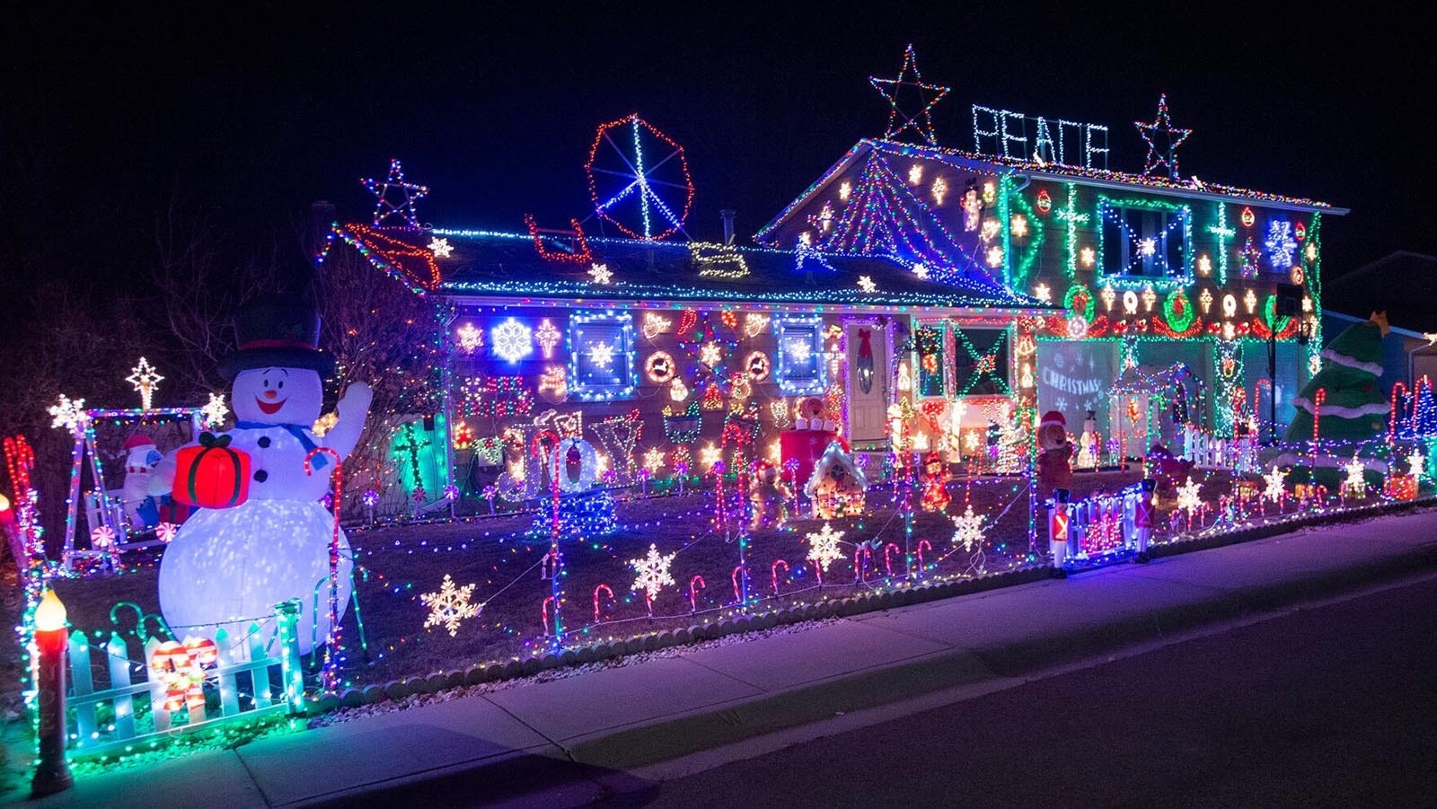 While Ed Lambert said he prefers a clean look to his Christmas decorating, he has no problem with others who like colorful, less structured displays, like this house at 811 Apricot St. in Gillette.