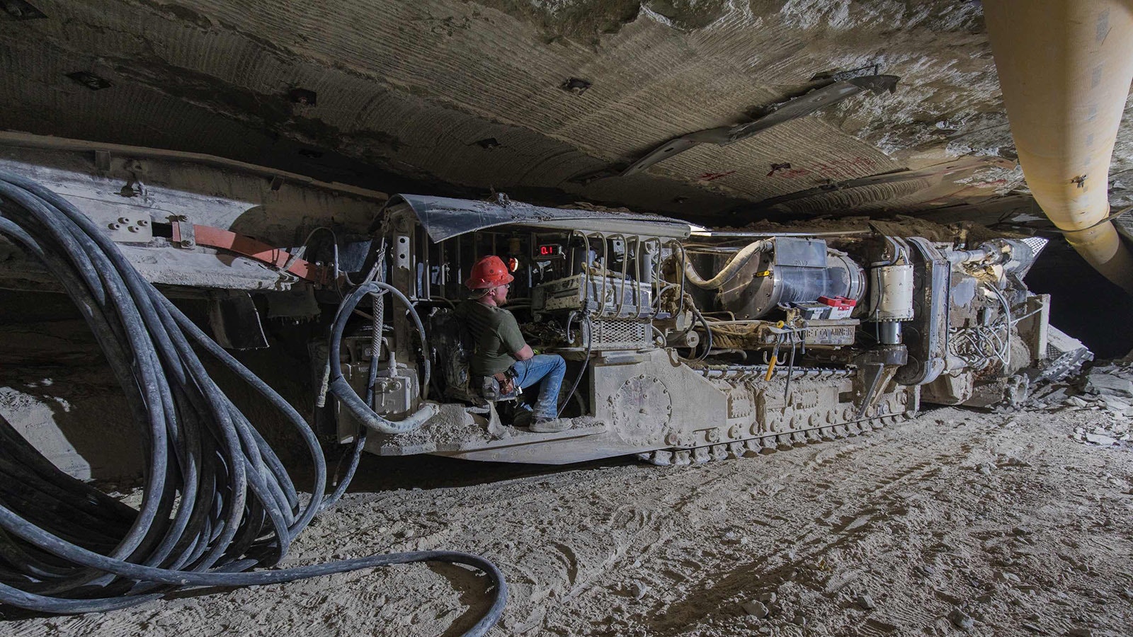 Genesis Alkali workers underground in the company's Wyoming trona mine operating continuous mining equipment and other machinery.