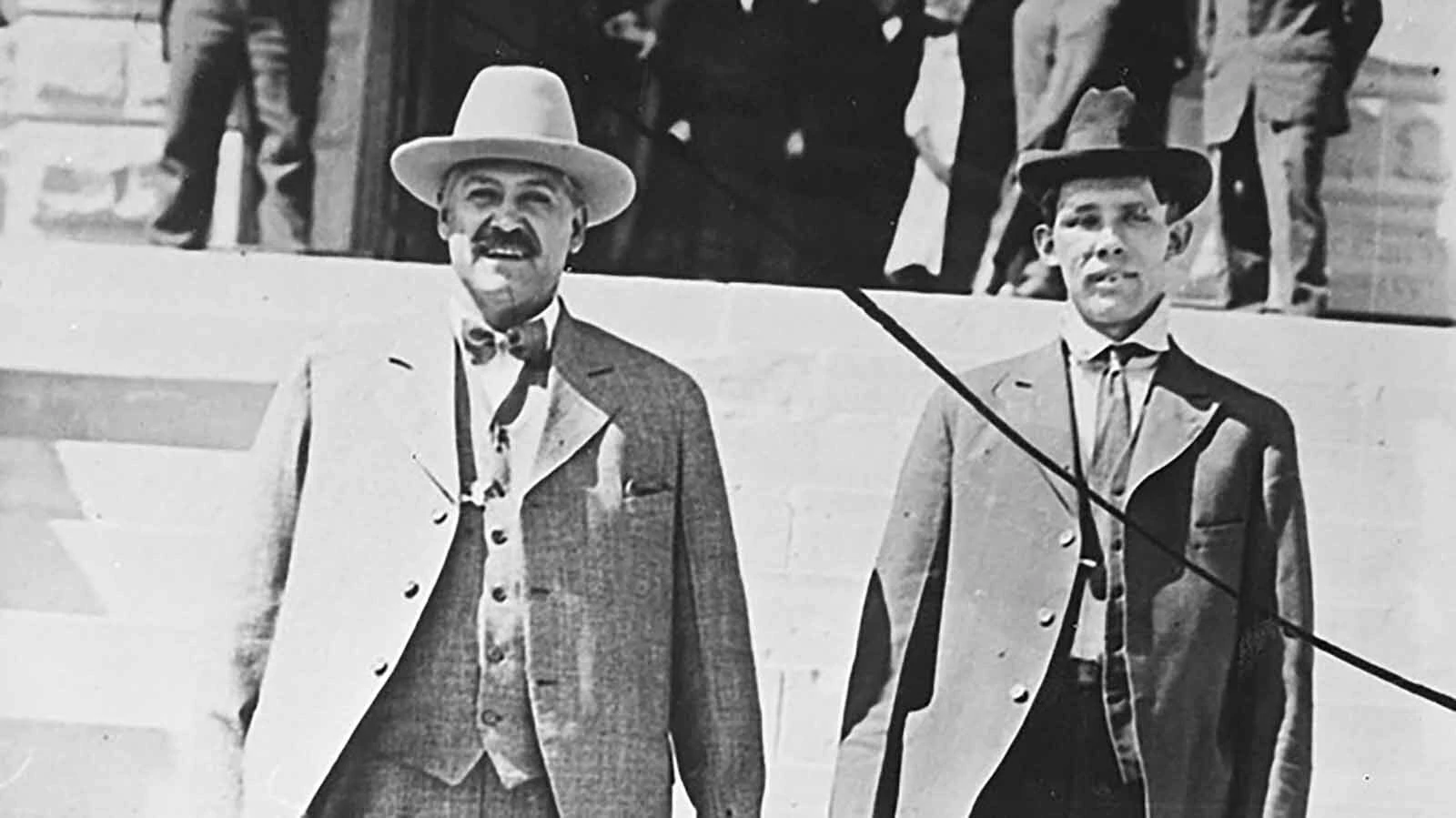 Bill Carlisle, right, with his first captor Sheriff Rubie Rivera, on the steps of the Carbon County courthouse in Rawlins, 1916.