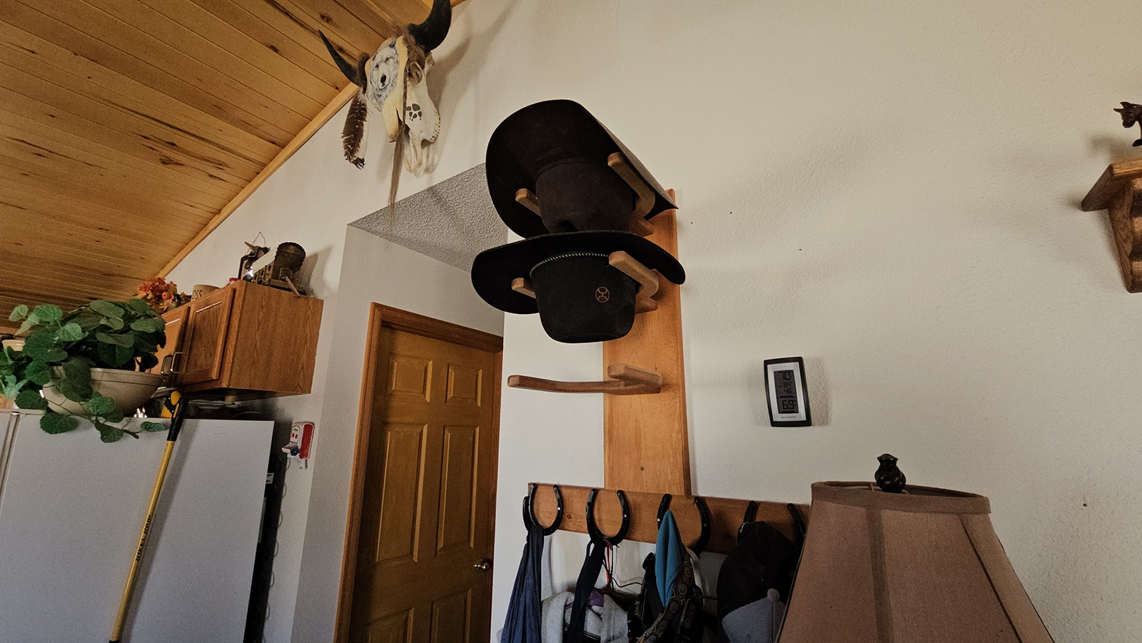 George Clark also likes to do woodworking projects around the house, like these hat racks.