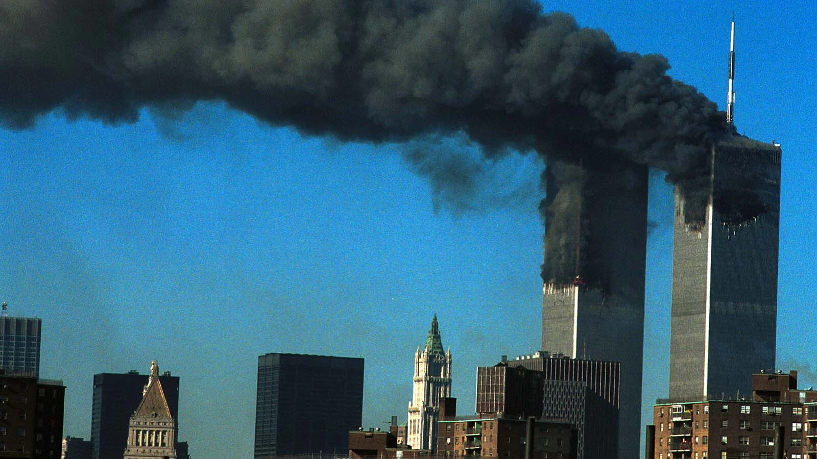 moke pours from the World Trade Center after being hit by two planes Sept. 11, 2001, in New York City.