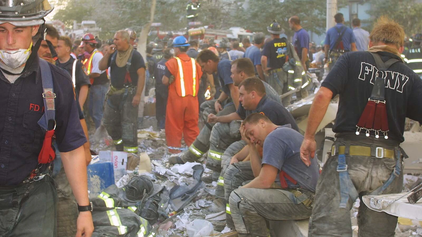 New York City firefighters and other rescue personnel work at the World Trade Center after two hijacked planes crashed into the Twin Towers on Sept. 11, 2001, in New York. Michael Hingson, who is blind, and his guide dog Rosalie survived.