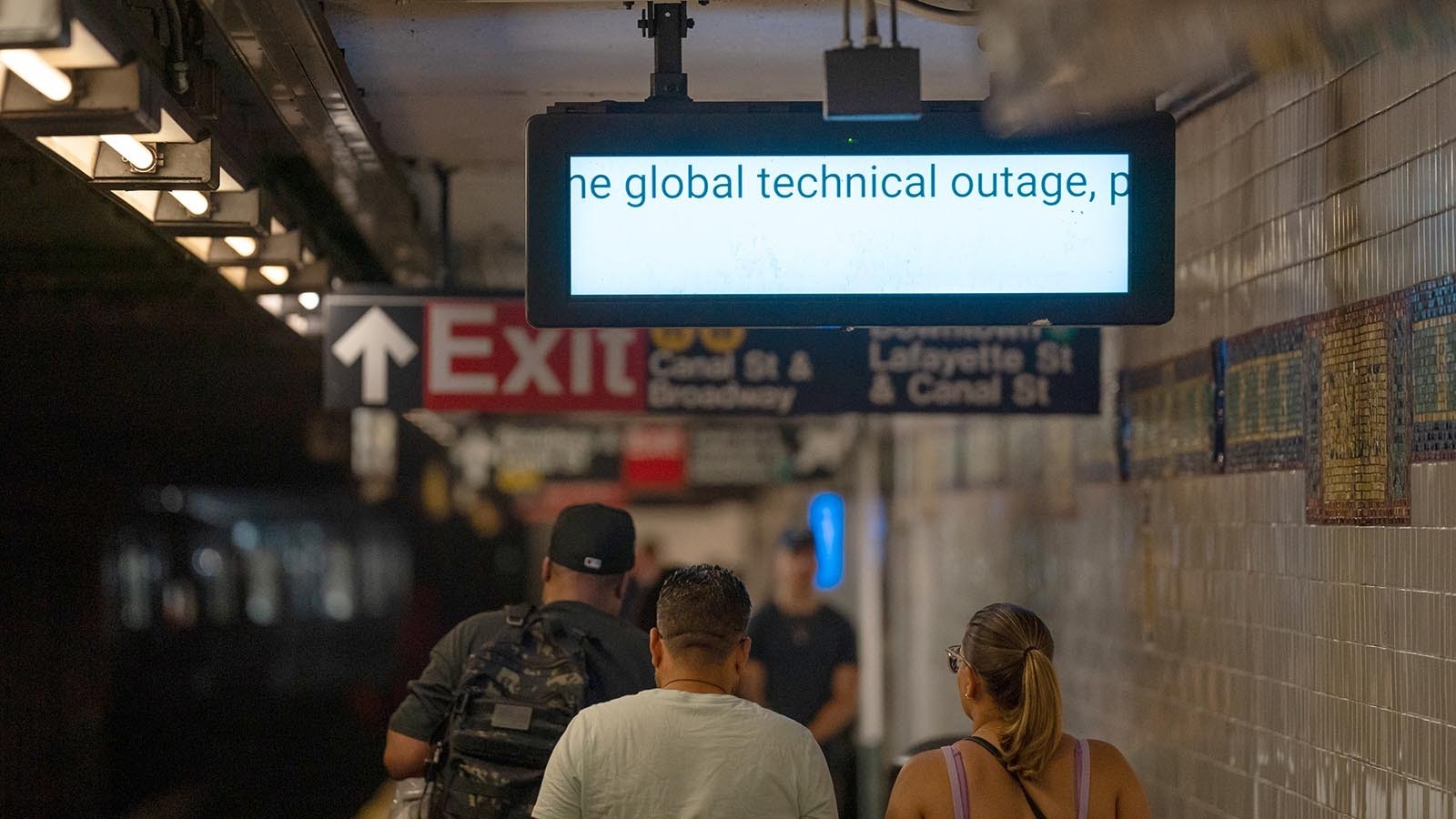 An information screen informs travelers that train information is not running due to the global technical outage at Canal Street subway station on July 19, 2024, in New York City. Businesses and transport worldwide were affected by a global technology outage that was attributed to a software update issued by CrowdStrike, a cybersecurity firm whose software is used by many industries around the world.