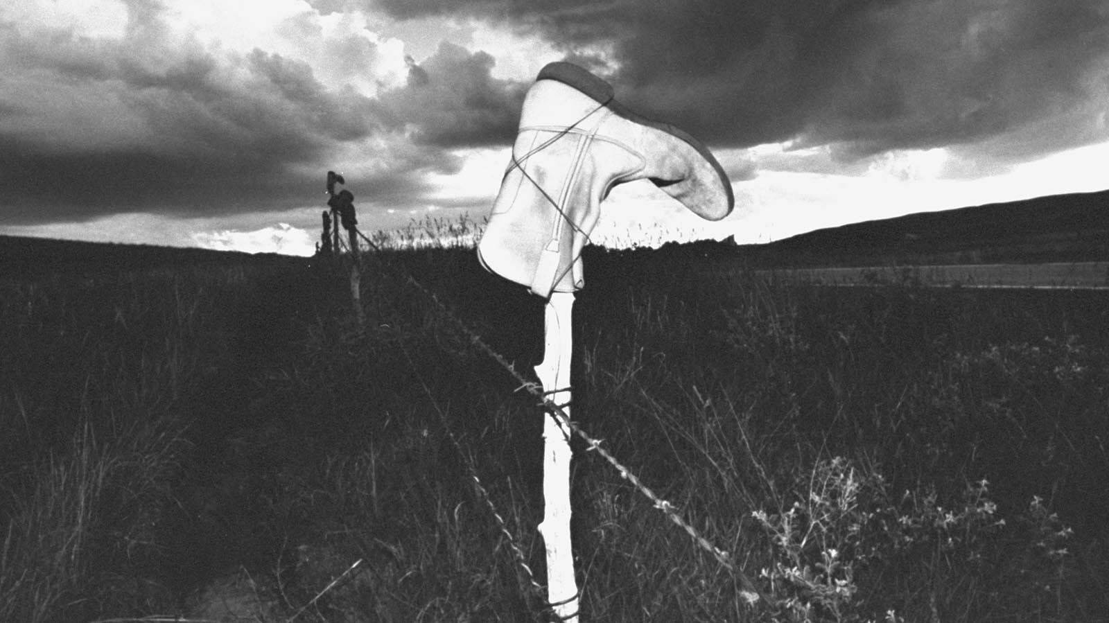 Old cowboy boots stuck upside down on fence posts can mean many things. They can be there to honor beloved horses, fallen cowboys or just to look cool. One thing’s for sure — it’s just Western.