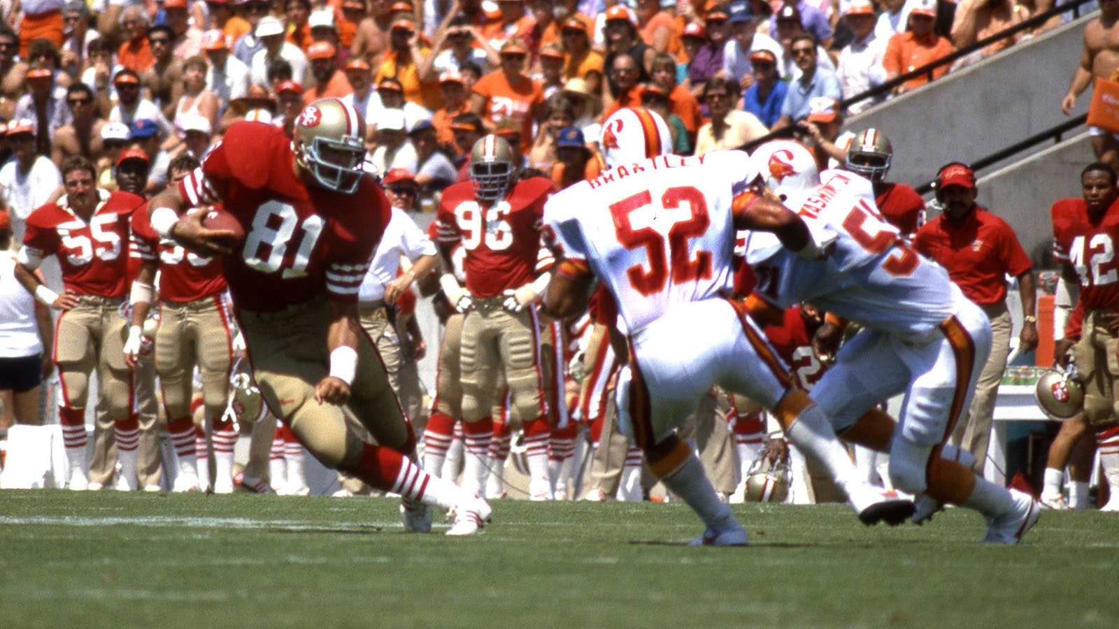 Francis of the San Francisco 49ers catches a pass during a game with the Tampa Bay Buccaneers at Tampa Stadium on Sept. 7, 1986. The 49ers won 31-7.