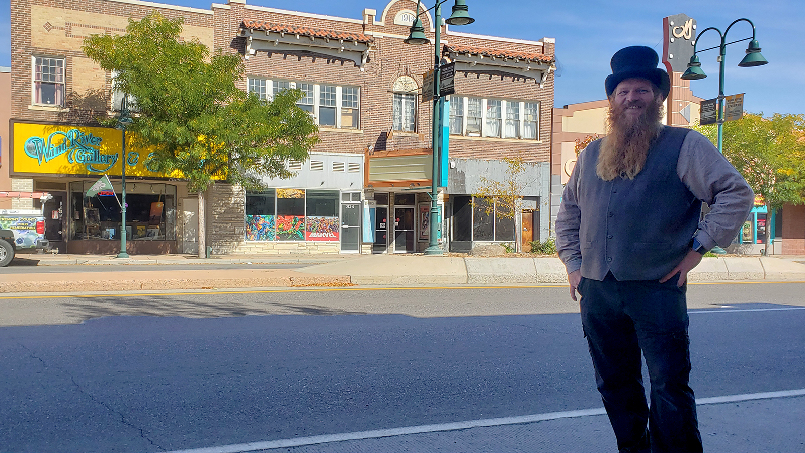 Guests at the historic Acme Theater, in the background, sometimes report seeing a figure watching movies from the balcony.