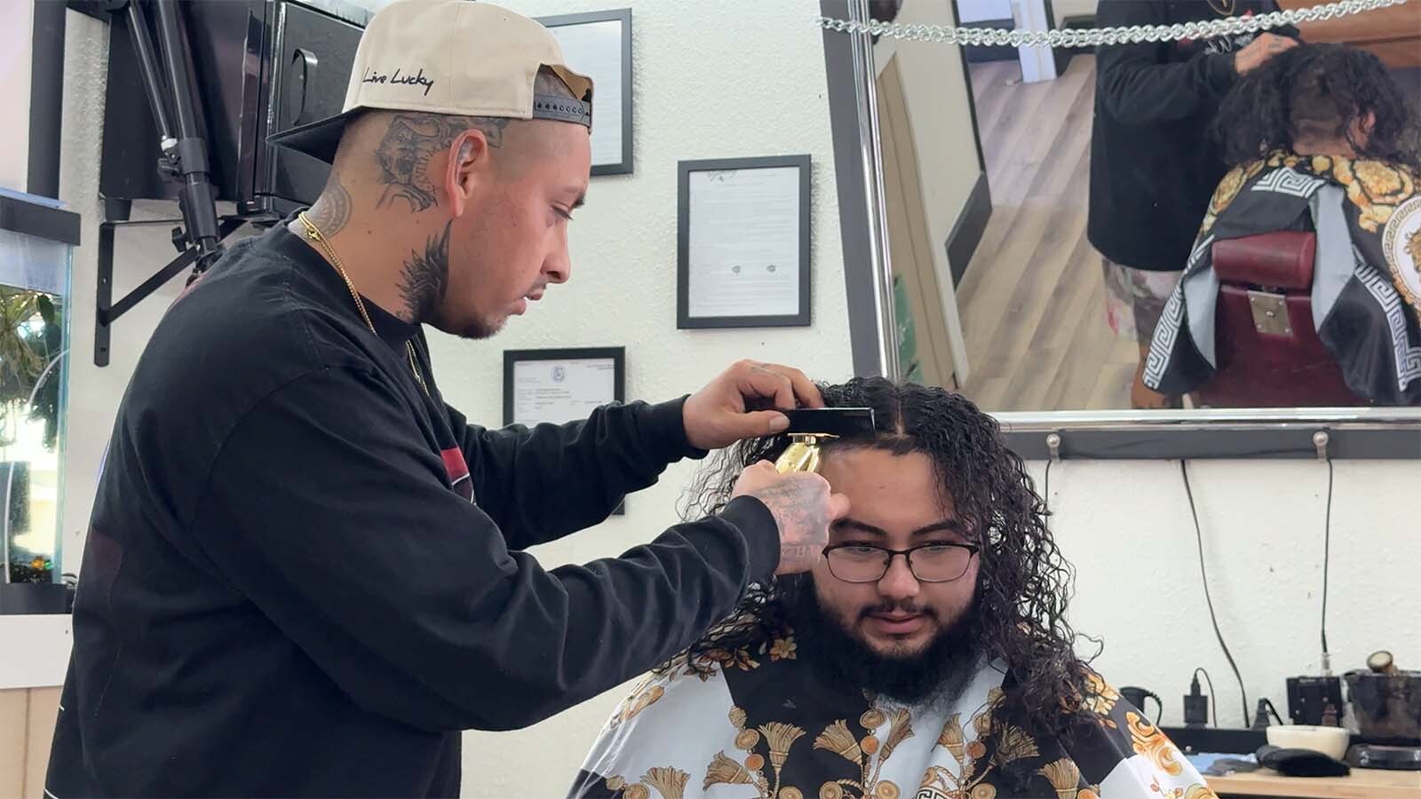 Gilbert Lucas easily chats with clients and isn't shy about sharing his story. It's one the Cheyenne barber said he doesn't believe himself at times, because it chronicles how he "went from being in prison to being a 'real' person."