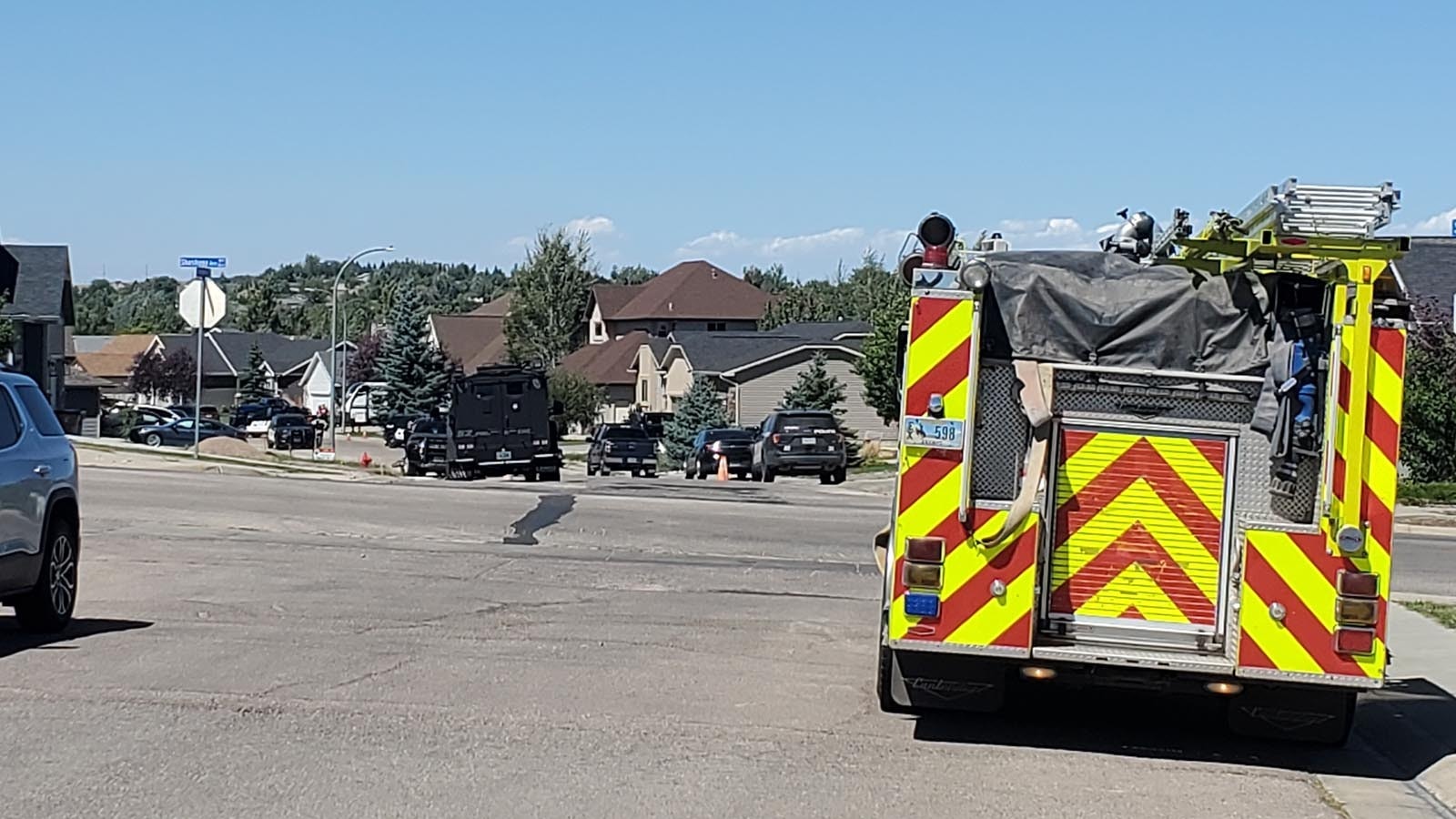 Police and emergency responders are positioned on Lexington Avenue in Gillette on Aug. 24, 2024, in response to a standoff-style situation.