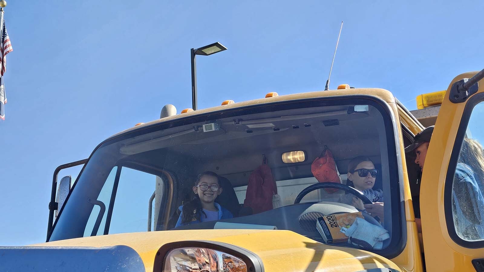 Octavia Ambrose, left, with her mom Jourdan, were among those who came to learn more about trucks during the annual Trucks Are For Girls Event, held every fall, at Eastern Wyoming College's Douglas campus.