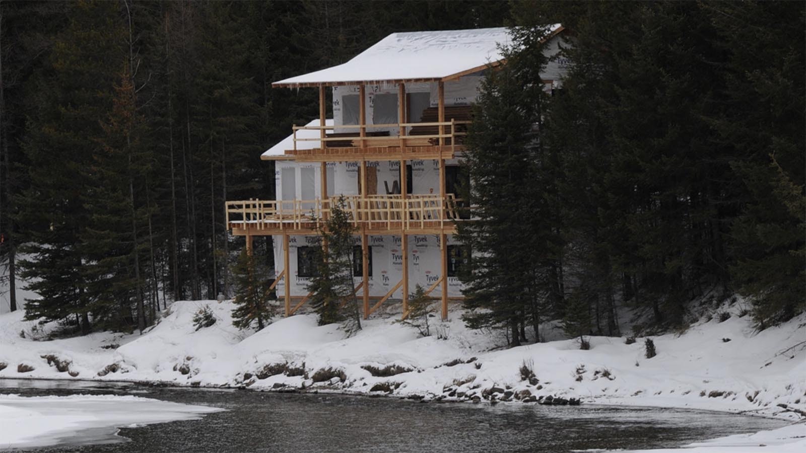 A local conservation district ordered the demolition of this partially built home on McDonald Creek, so the homeowners sued in federal court to stop the wrecking ball.