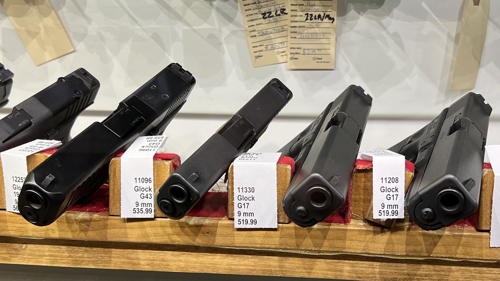 Glock Pistols, like these at the West Laramie Fly Store in Laramie, among the best-selling firearms in Wyoming.