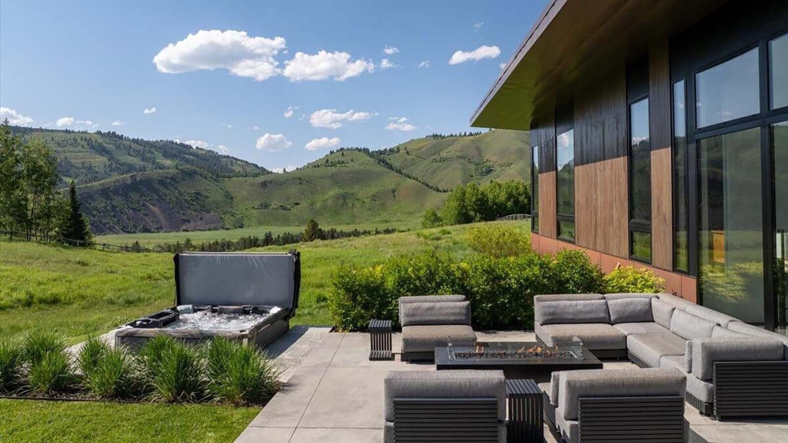 Outside there's an area perfectly suited to al fresco dining as well as a nice hot tub to relax in after a day of adventuring.