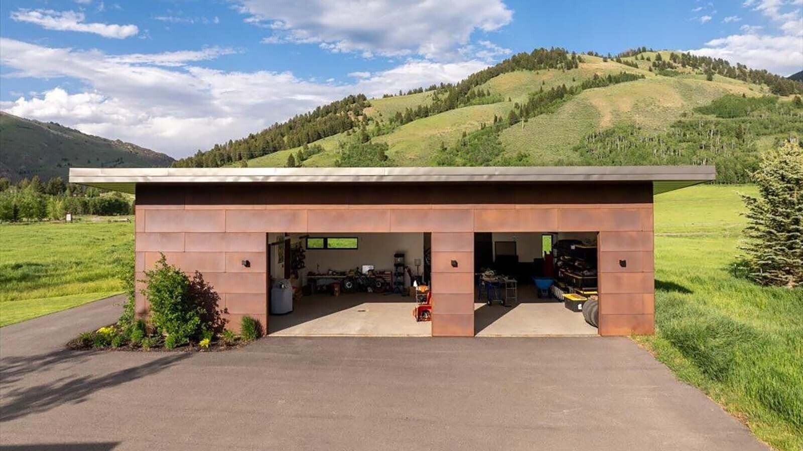 The toy barn has room for up to three vehicles and lots of toys.