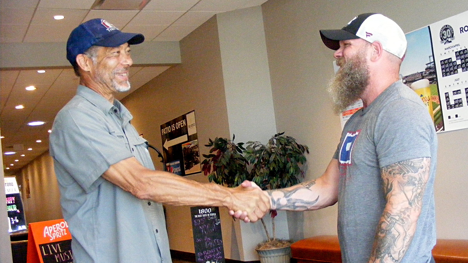 Tom Hutchings, left, meets John Ysebaert, one of the men who saved his life after she suffered from cardiac arrest while driving on Interstate 25.