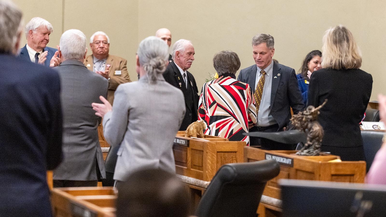 Gov. Mark Gordon shakes hands with Wyoming legislators on the last day of the 2025 session Thursdy, March 6, 2025.