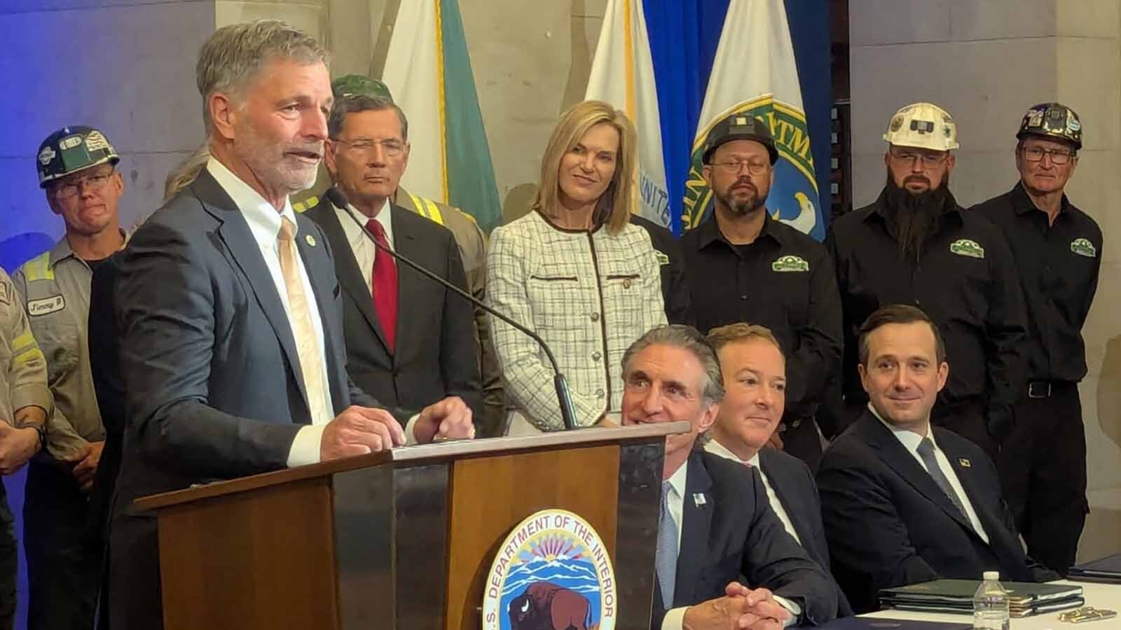 Wyoming Gov. Mark Gordon with U.S. Sen. John Barrasso and Interrior Secretary Doug Bergum during Monday's announcement of the Trump administration's $625 million investment in coal-fired power plants and production.