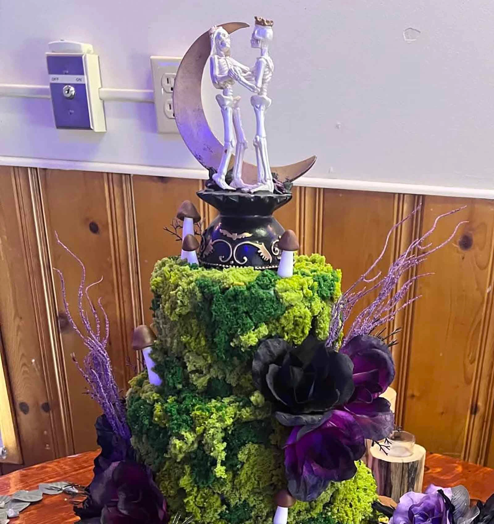 AnnChey Everhart’s wedding cake reflects natural elements and skeletons dancing beneath the moon.