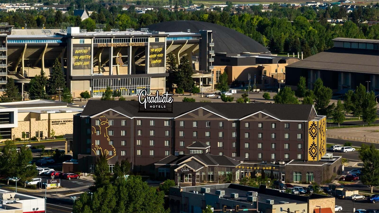 The Hilton Garden Inn on the University of Wyoming campus, across the road from War Memorial Stadium in Laramie, is getting a facelift. It’s being remodeled into a UW-branded “Graduate Hotel.” Above is an illustration of what the rebranded hotel could look like.