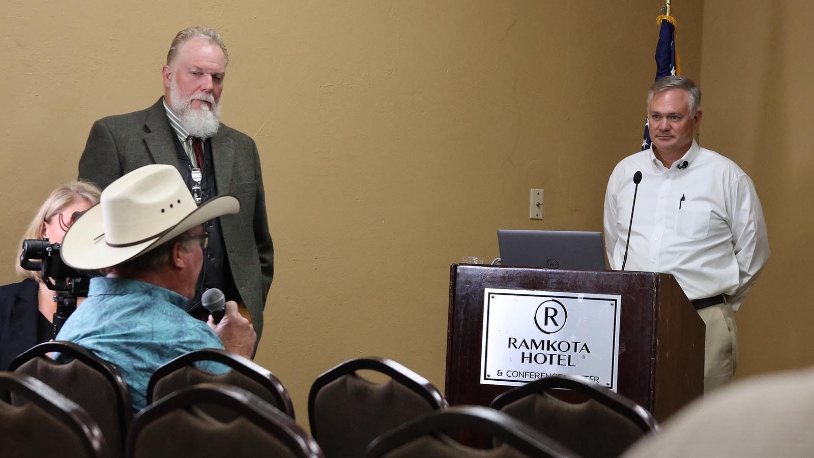 Coates Road resident and former mining expert Bruce Lawson challenges Kyle True about his plans for gravel mining at the base of Casper Mountain in the School Section of the area.