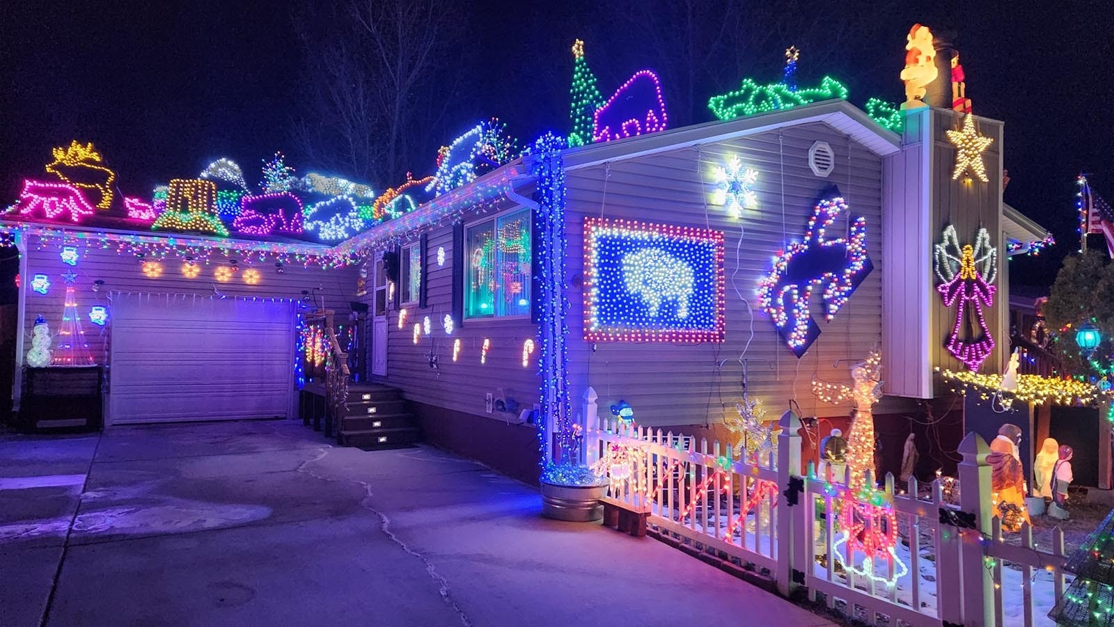 Folks in Green River may not know Robert Bostick personally, but they know his house. It’s the one covered in thousands of holiday lights forming the Grand Tetons, life-sized wildlife cutouts and his tribute to all things Wyoming.