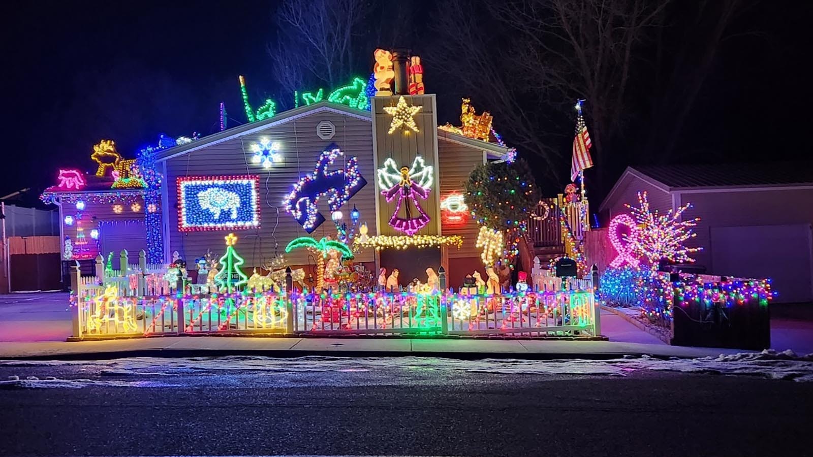 Folks in Green River may not know Robert Bostick personally, but they know his house. It’s the one covered in thousands of holiday lights forming the Grand Tetons, life-sized wildlife cutouts and his tribute to all things Wyoming.