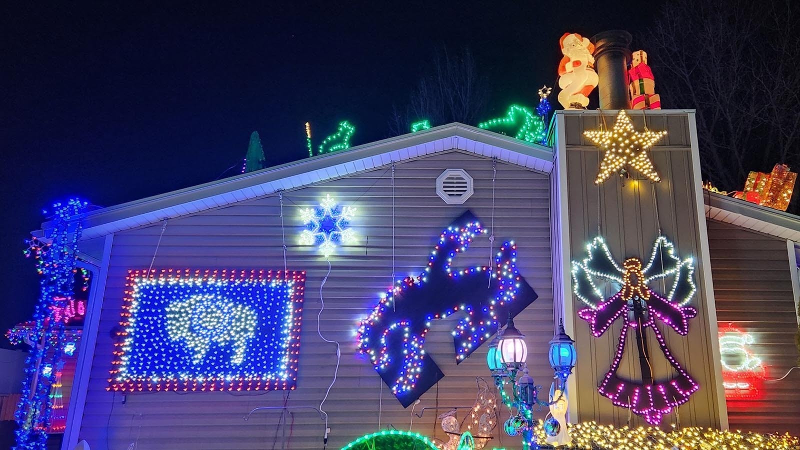 Folks in Green River may not know Robert Bostick personally, but they know his house. It’s the one covered in thousands of holiday lights forming the Grand Tetons, life-sized wildlife cutouts and his tribute to all things Wyoming.