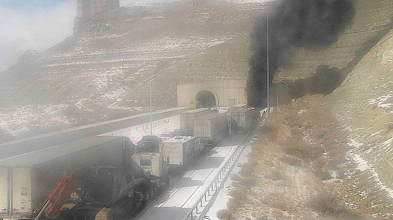 Heavy, black smoke continues to billow out of both ends of the Green River tunnels along Interstate 80 after a fatal multivehicle pileup and fire inside Friday afternoon. People in traffic report “huge explosions.”