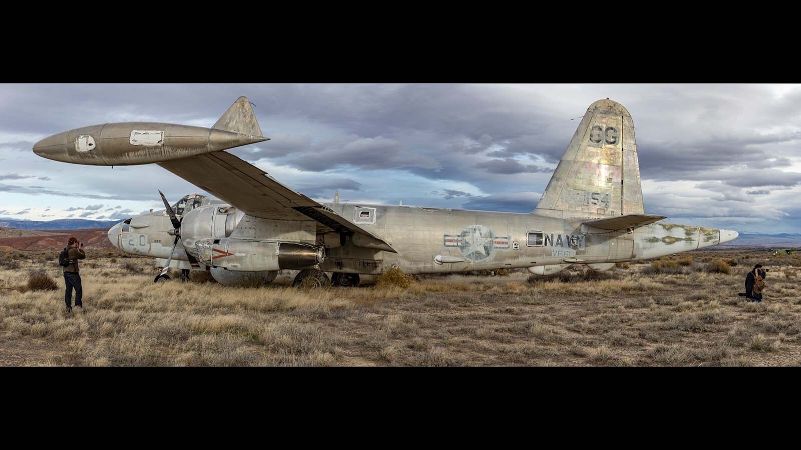 Freshmen and sophomore photography students from Northwest College in Powell, Wyoming, photograph the 11 vintage airplanes that were recently aucioned off in Greybull.