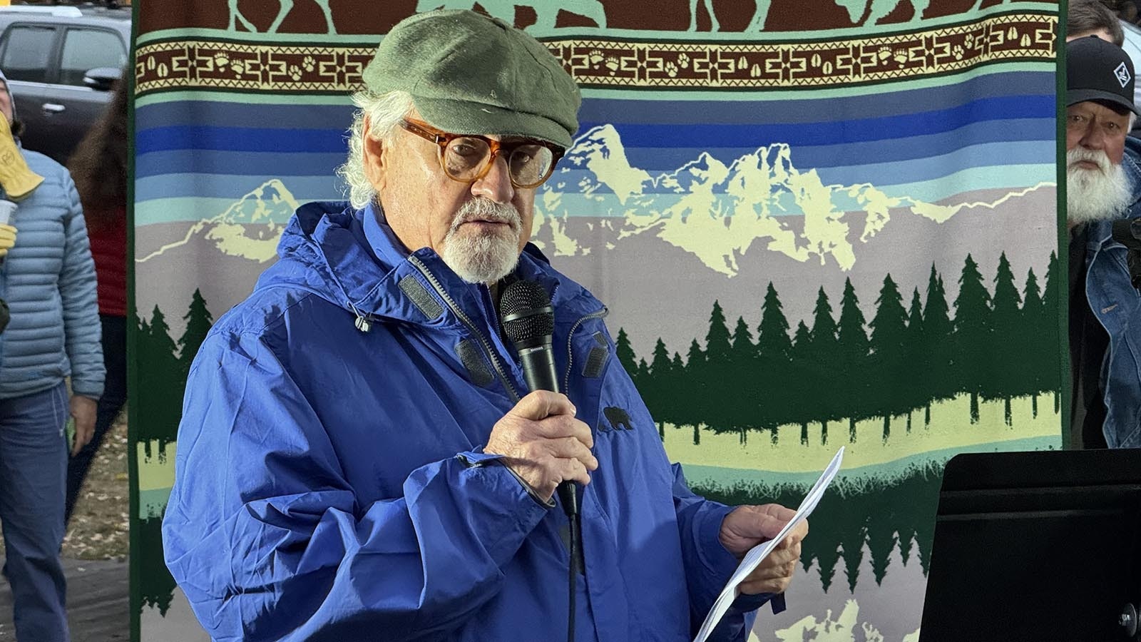 Wildlife photographer Tom Manglesen, described as “Grizzly 399’s most dedicated photographer,” speaks at a candlelight vigil for 399 in Jackson on Nov. 2, 2024.