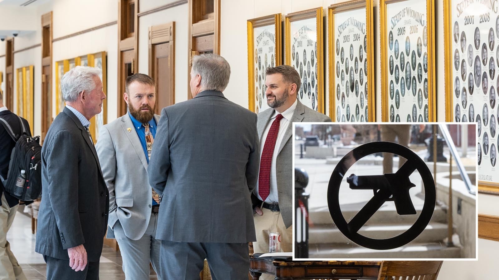 Wyoming legislators and lobbyists talk in the hallway at the state Capitol before a Senate Judiciary Committee meeting where repealing gun-free zones was discussed.