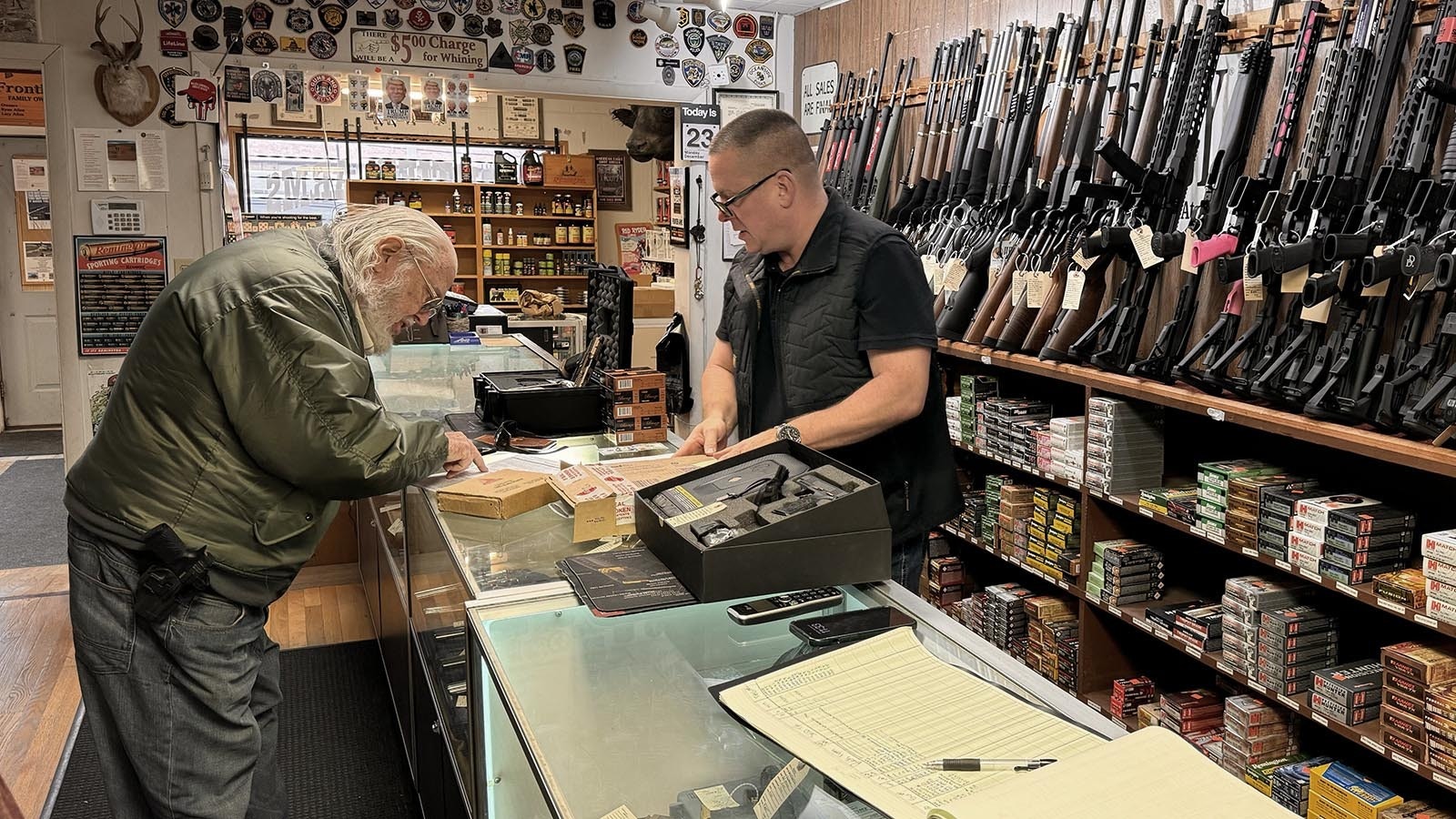 Ryan Allen, owner of Frontier Arms in Cheyenne, was busy Monday two days before Christmas. He said a first gun for a 12- or 13-year-old is a popular gift. He recommends a .22.