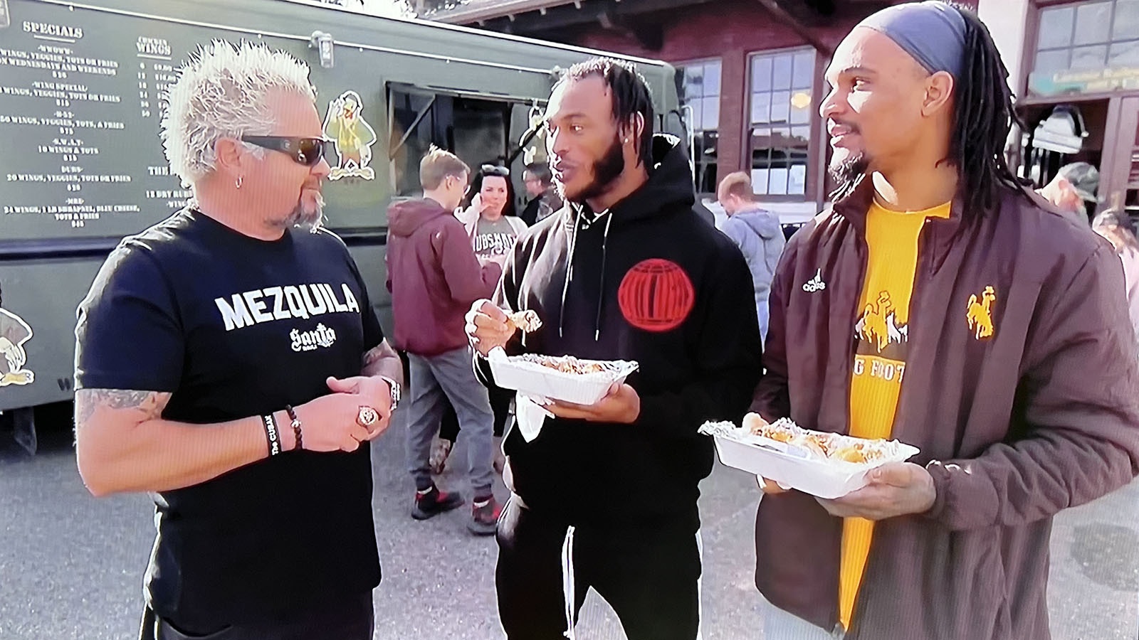 Guy Fieri talks with fans of the Weitzel's Wings food truck in Laramie during a 2021 visit. Fieri filmed segments for six of his "Diners, Drive-Ins and Dives" show during that visit.