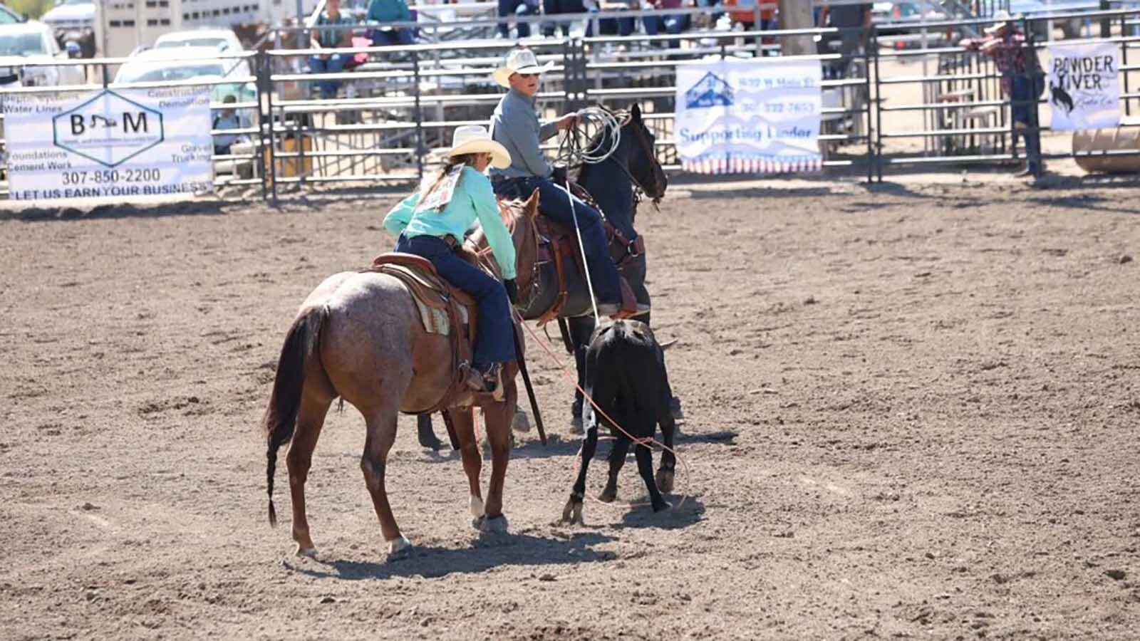 Carter Hutchison of Rozet competes with Halle Crozier as his heeler. "I'm just glad she wanted to rope with me, honestly," he said.