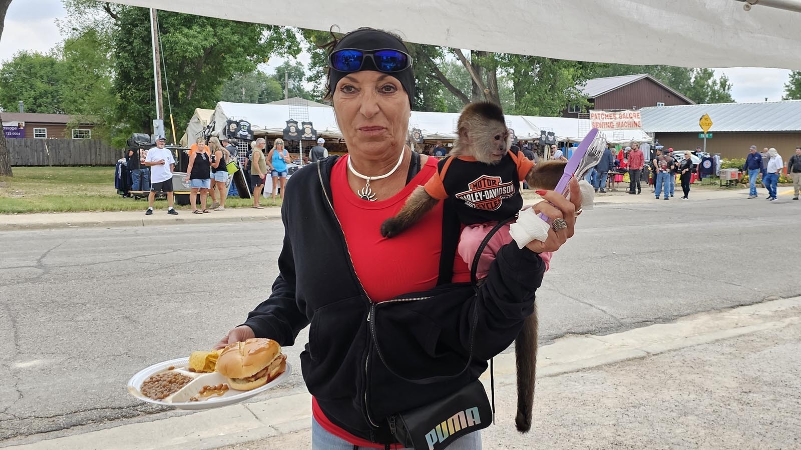 Cintia Foster with her baby monkey, Julie, who is 9 months old. Foster is originally from Brazil, but lives in Florida.