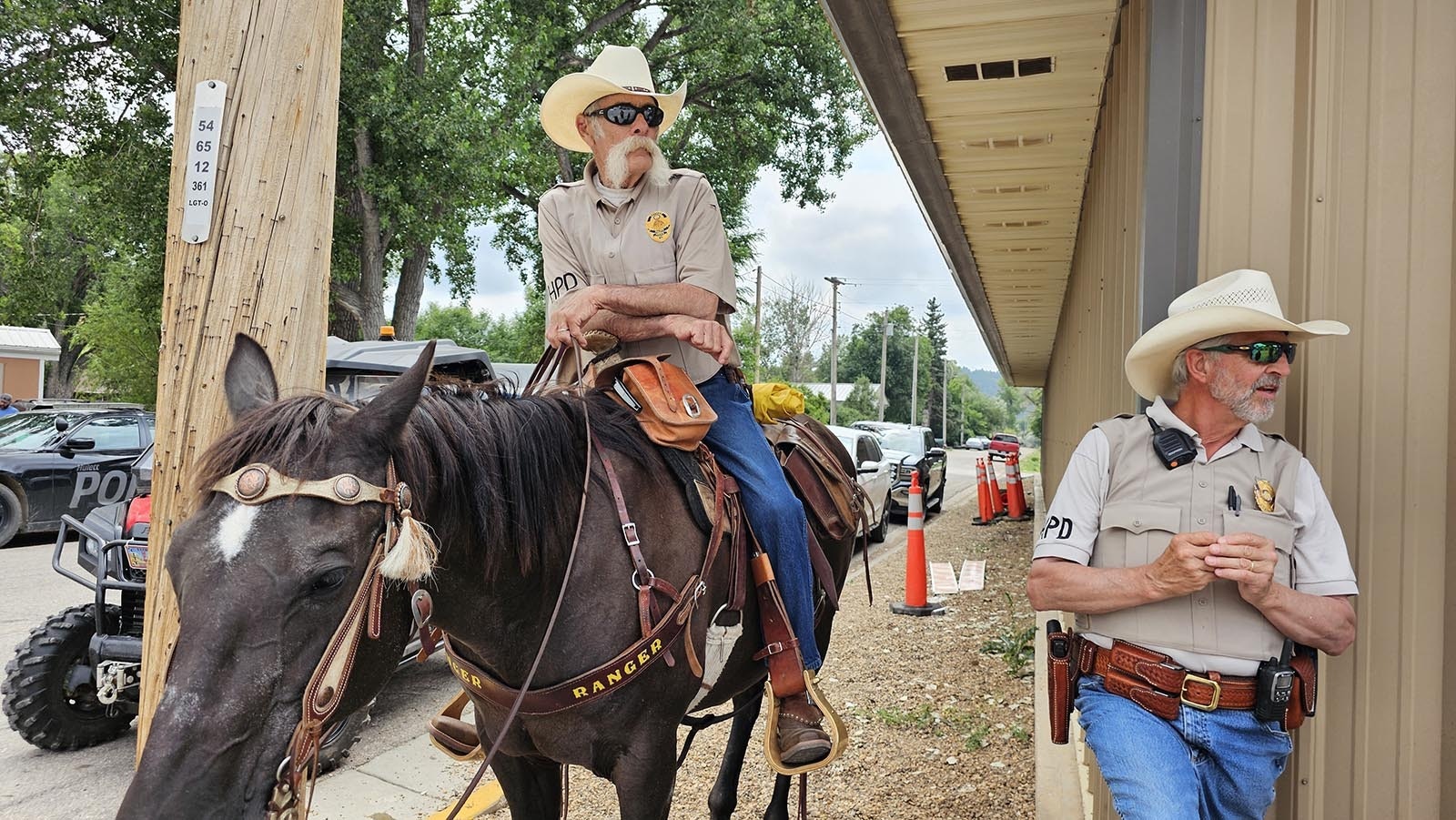 Hulett Police Chief Bill Motley, right, with one of his officers who is mounted patrol certified.