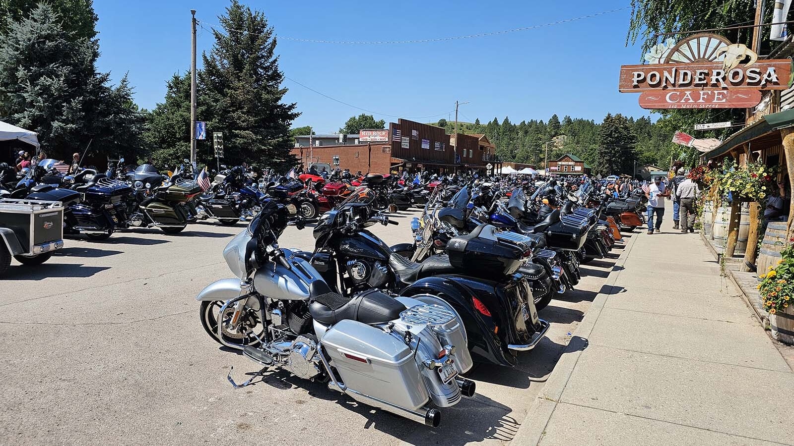About 25,000 Sturgis Motorcycle Rally bikers made a pit stop in tiny Hulett, Wyoming, on Wednesday for the town’s famous Ham and Jam street party. Free barbecue and revving engines through the main drag are traditions some bikers have kept going for decades.