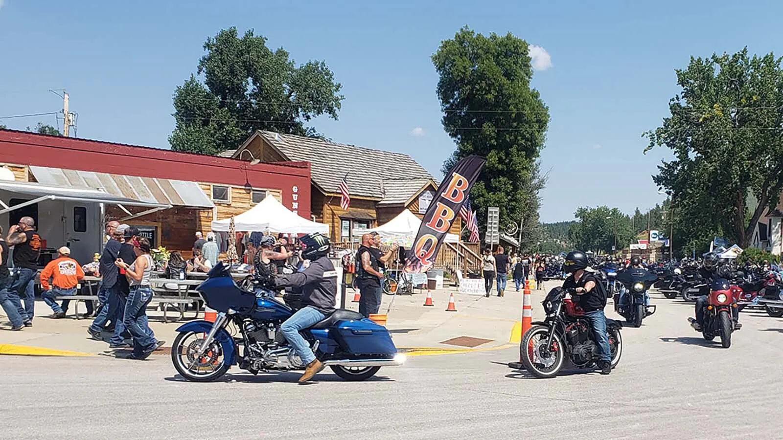 Bike after bike after bike rolls into the tiny town of Hulett every year during the Sturgis Motorcycle Rally for the Ham-N-Jam free food and music at Captain Ron's Rodeo Bar Lounge.
