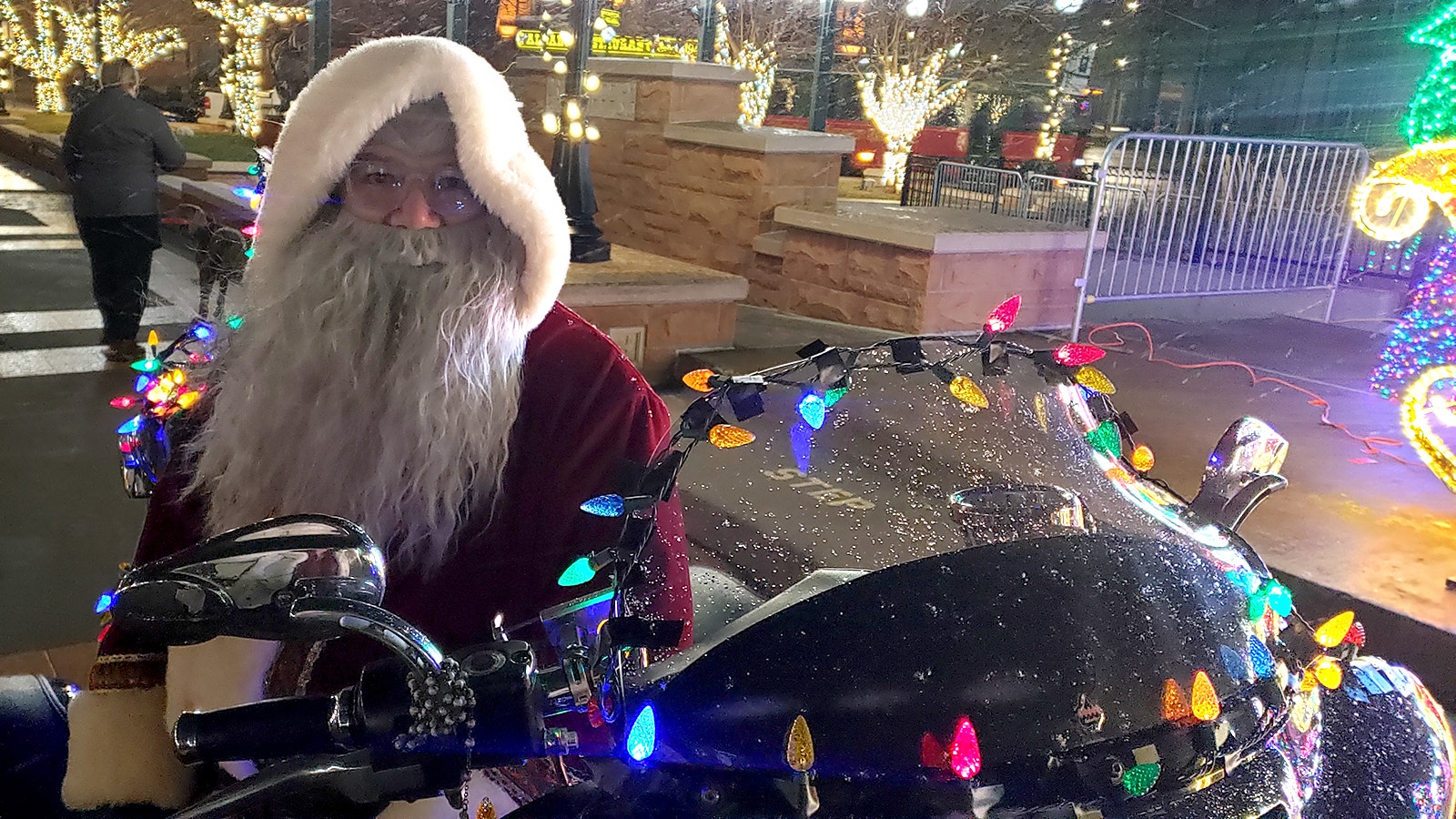 Rick Ramos as Santa takes a break from riding around downtown Cheyenne.