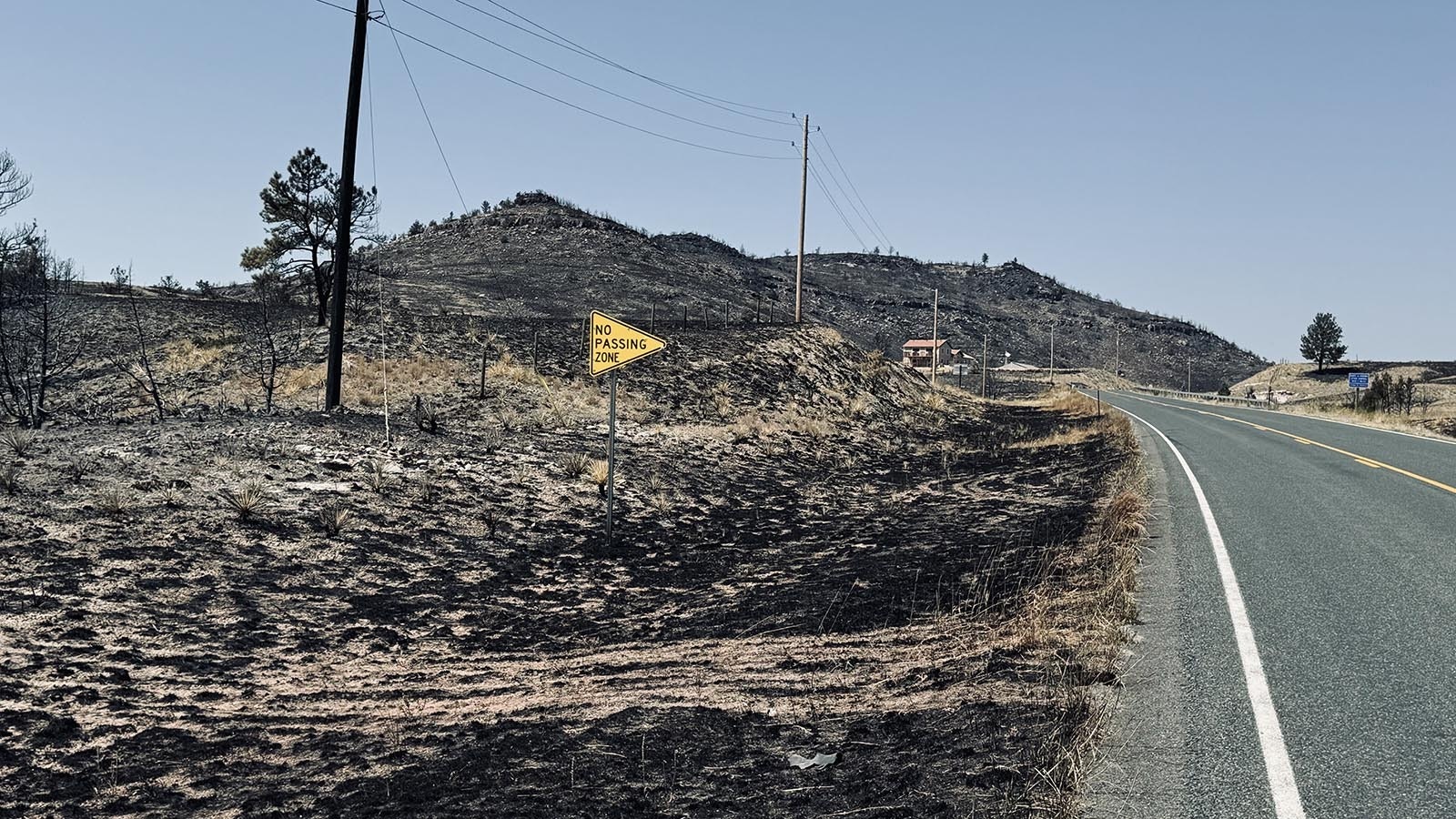 The hills were blackened by the Pleasant Valley Fire to the east of Wyoming 270 that runs from Guernsey to Hartville.