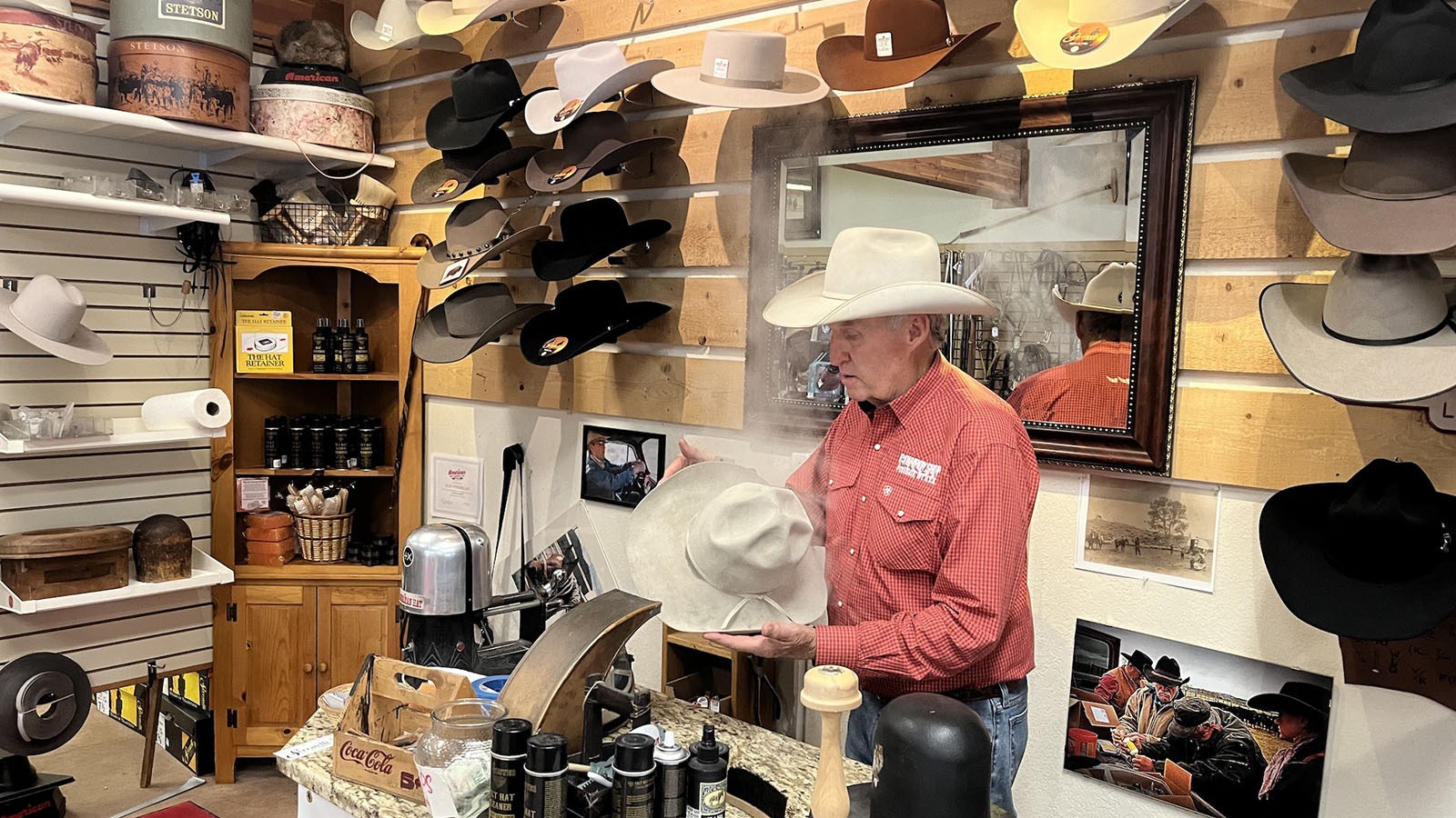 Bob Bing works a hat at the Cowboy Shop in Pinedale.